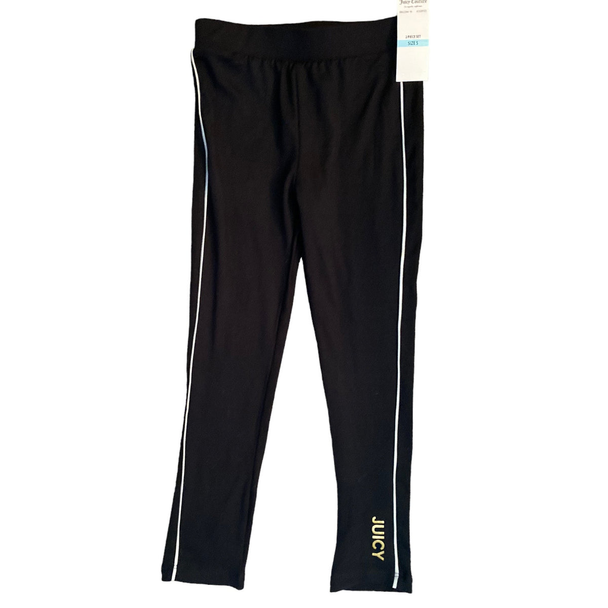 Black Juicy Couture leggings with white side stripes and gold logo text on the lower leg, shown flat on a white background with a tag attached.