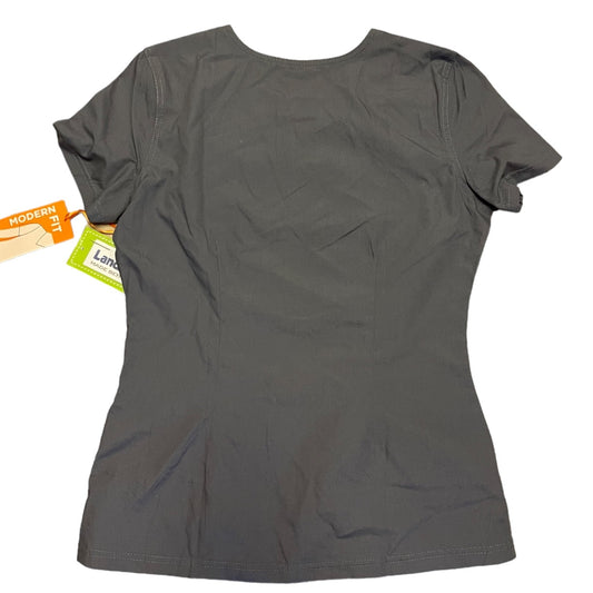 A dark gray short-sleeve shirt shown from the back, with a hangtag still attached on the left side, photographed against a plain white background.