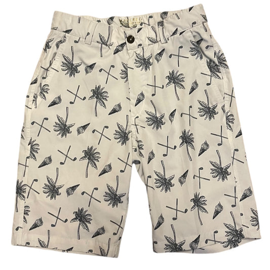 A pair of men's shorts in cream color, featuring an all-over print of palm trees, golf clubs, and golf balls. The shorts are laid flat against a white background.