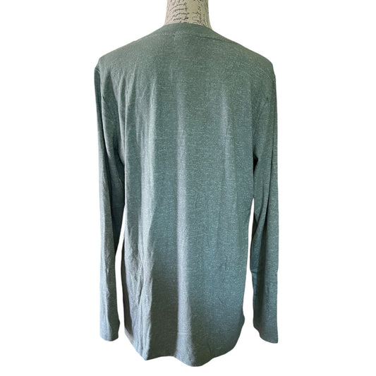 A long-sleeve knit top in a sage green color, displayed on a dress form mannequin against a plain white background.