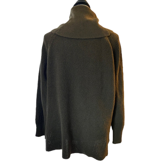 A green knit sweater with a high ribbed mock neck collar, displayed on a mannequin against a plain white background.