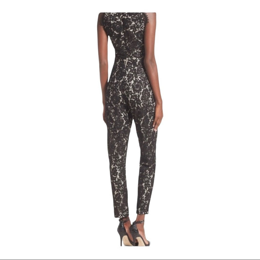 Back of Black and white patterned pants worn by a model on a white background
