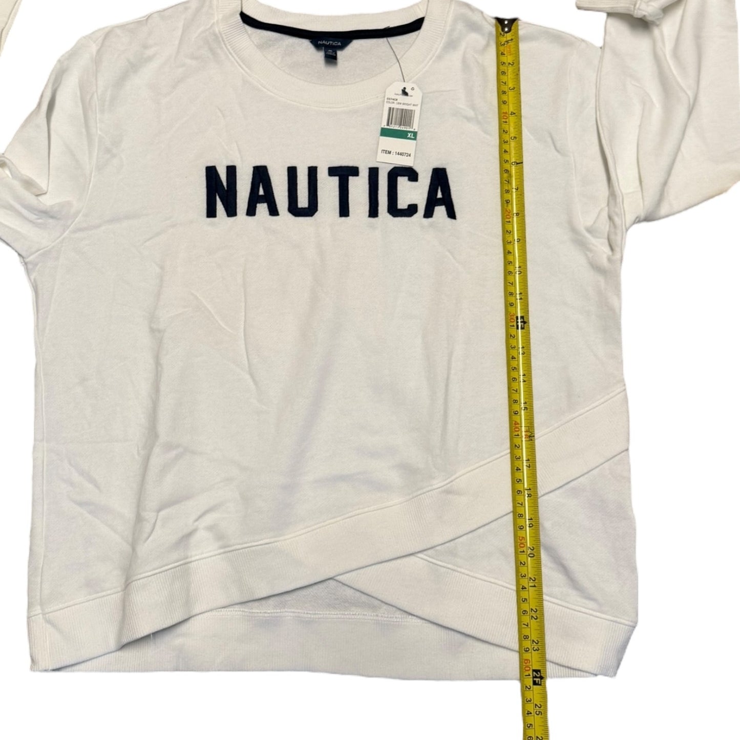 Nautica shirt with a measuring tape on a white background