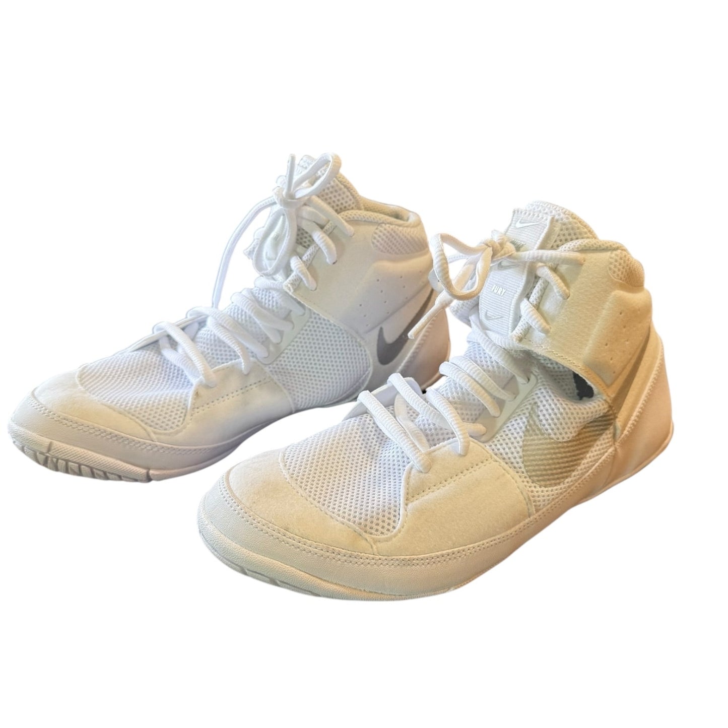 A pair of white high-top athletic sneakers with mesh panels, white laces, and a subtle logo on the side, shown against a plain white background.