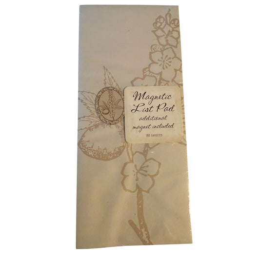 A beige Magnetic list notepad with floral line-art illustrations and a central label that reads 'Magnetic List Pad additional magnet included 80 sheets' on a plain white background.