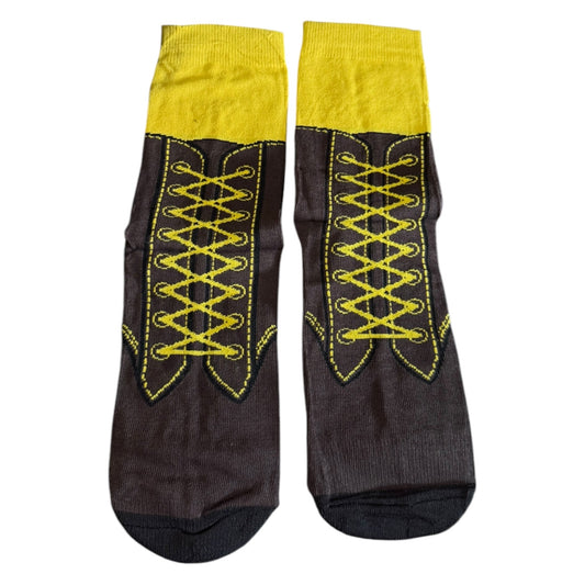 A pair of dark brown socks with a bright yellow cuff and a yellow lace-up corset design on the front, displayed against a plain white background.