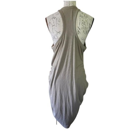A sleeveless green tank dress from the back, displayed on a mannequin against a white background.