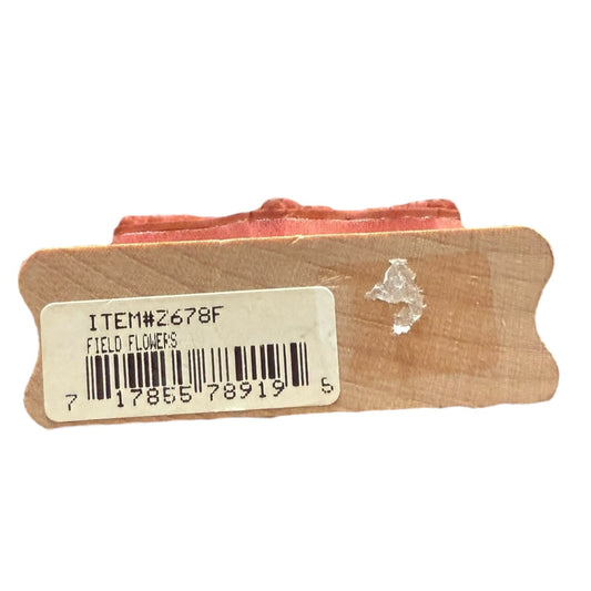 Field Flowers with a label on a white background