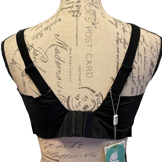 Back of Black bra on a mannequin with a vintage-style background