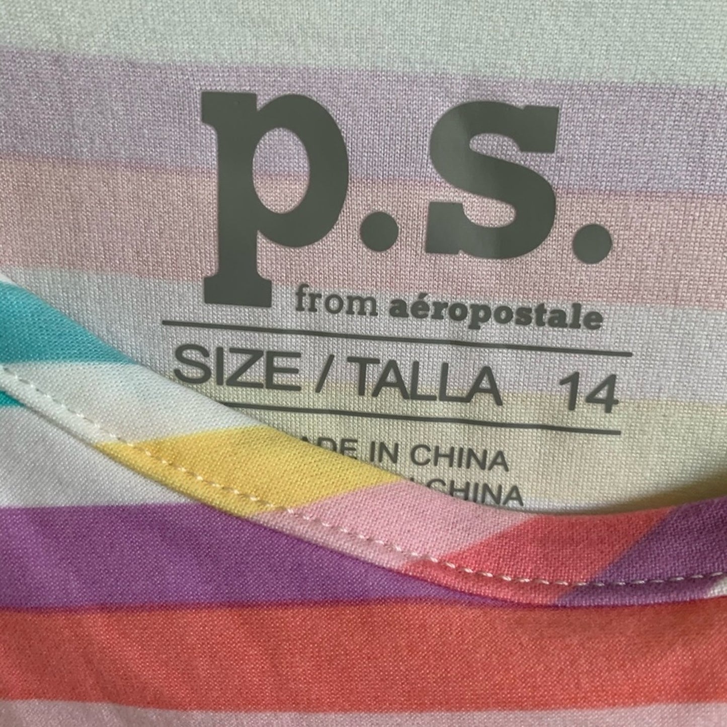 Close-up of a striped garment label reading p.s. from aeropostale