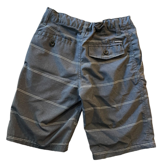 Back of gray striped shorts on a white background