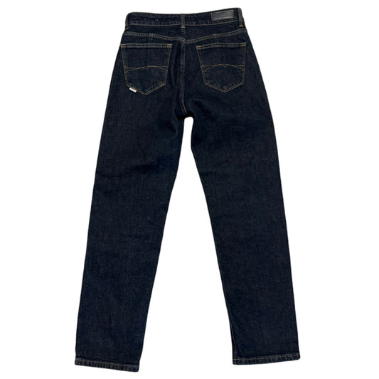 Dark blue jeans back on a white background