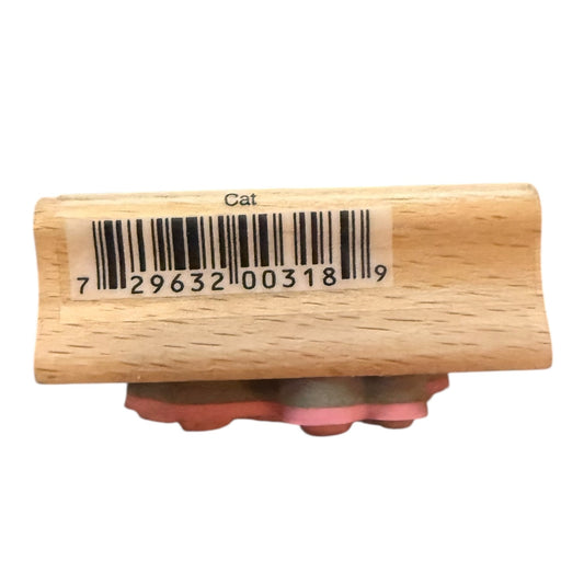 Side view of bar code on a wood block on a white background.