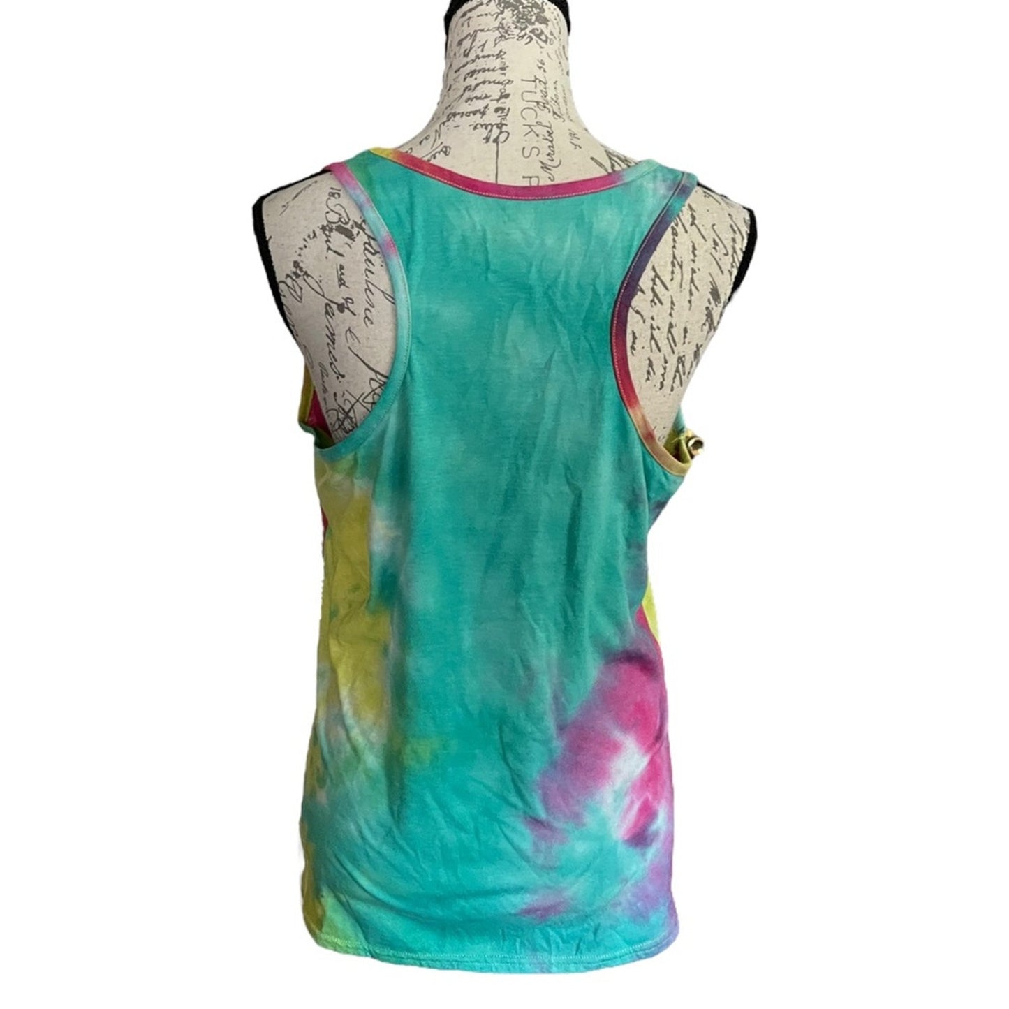 A sleeveless tank top with a vibrant tie-dye pattern in teal, pink, yellow, and purple, displayed on a vintage-style mannequin against a white background.
