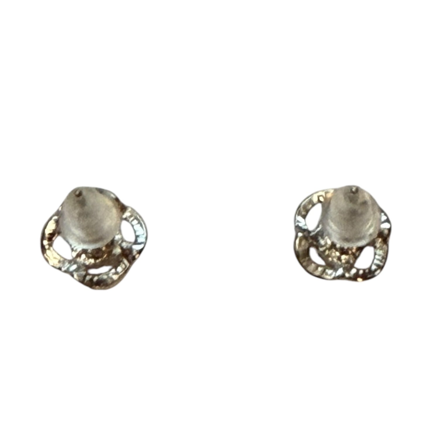 A pair of silver-toned earrings with textured, back of flower design earrings, shown on a plain white background.