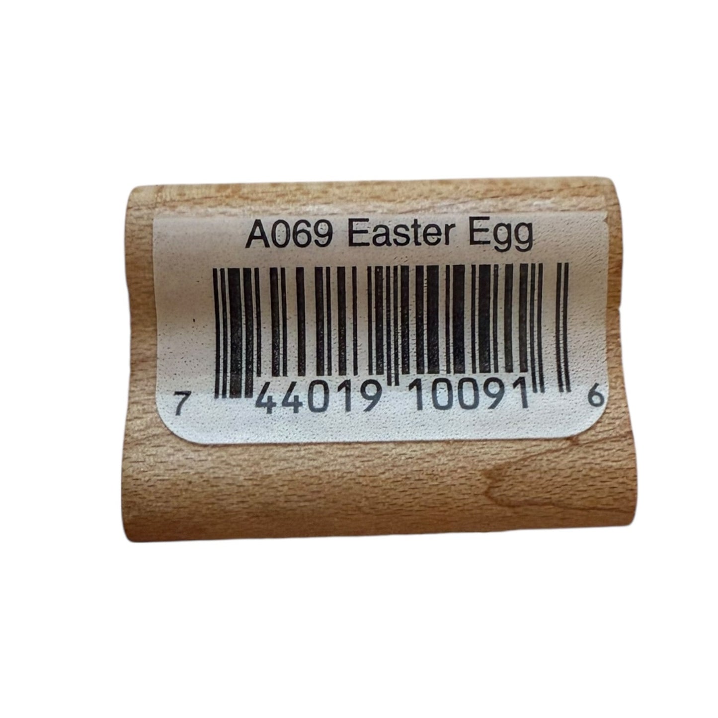 A small wooden block with a white label that reads 'A069 Easter Egg' above a barcode, shown on a plain white background.