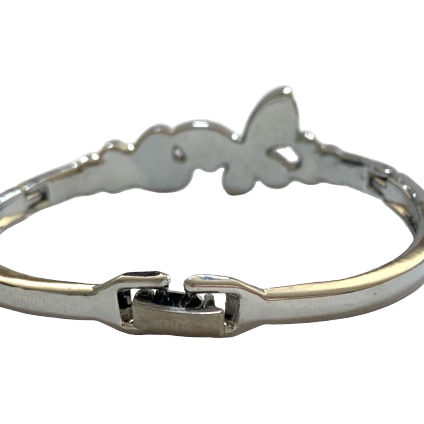 A silver-toned metal bangle bracelet featuring a butterfly-shape from the back and a clasp closure, shown against a plain white background.