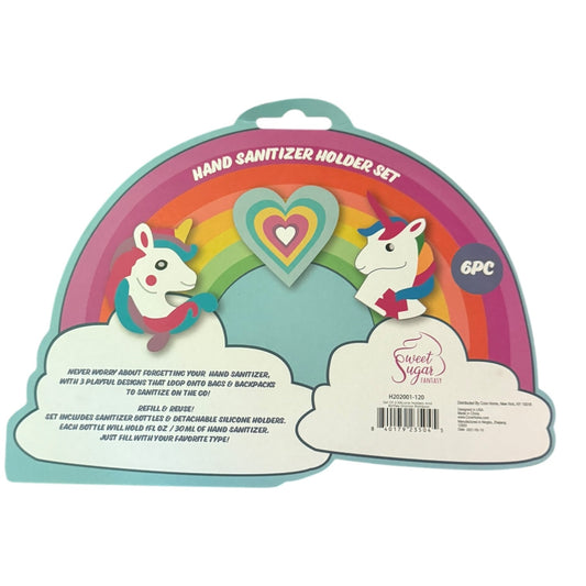 Unicorn-themed hand sanitizer holder set in its retail packaging, featuring a colorful rainbow arch, two white unicorns, and a heart-shaped center, with product details printed on the front.