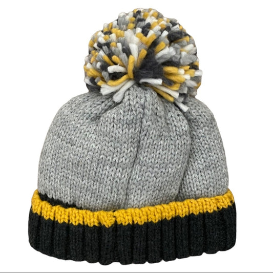 Knitted beanie with a colorful pom-pom on a white background