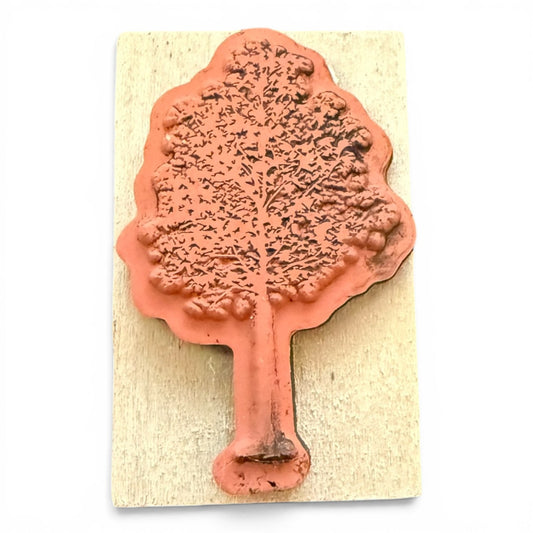 Tree-shaped stamp on a beige background