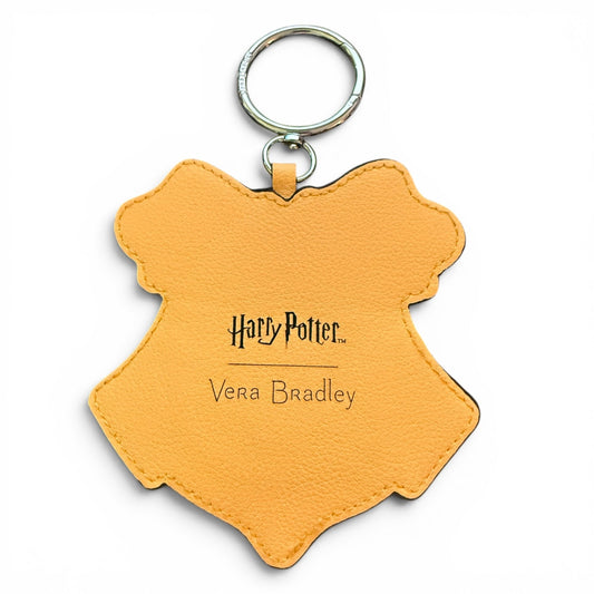 Yellow bag charm with 'Harry Potter' and 'Vera Bradley' branding on a white background