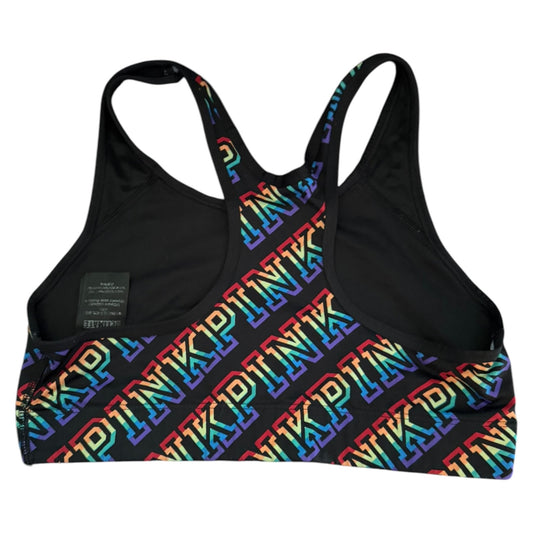 Back of sports bra with a rainbow PINK print on a white background.