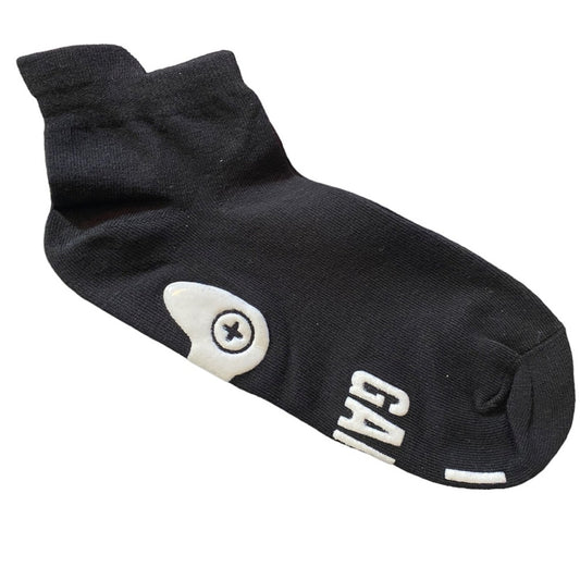 Black socks with white print on a white background