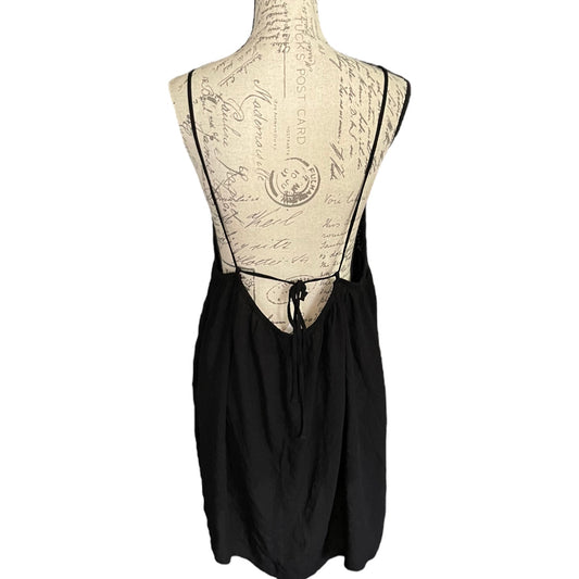 Back of black strappy swimsuit cover up on a white background
