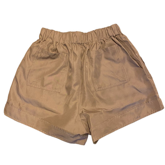 A pair of women's casual shorts in a light brown, featuring an elastic waistband, two large patch pockets on the back, and a relaxed, straight-leg fit. The shorts are photographed flat against a solid white background.