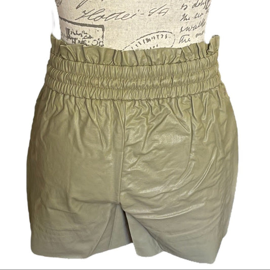 Back of shorts on a mannequin on a white background
