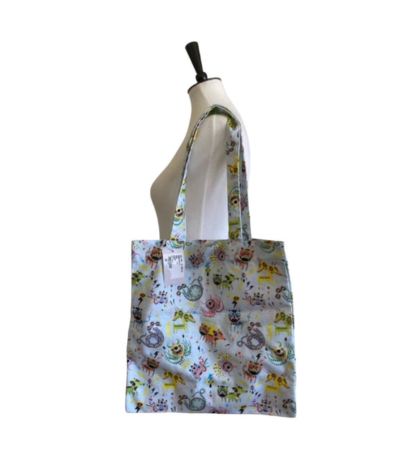 Handbag collection with front photo featuring a blue monster gucci purse