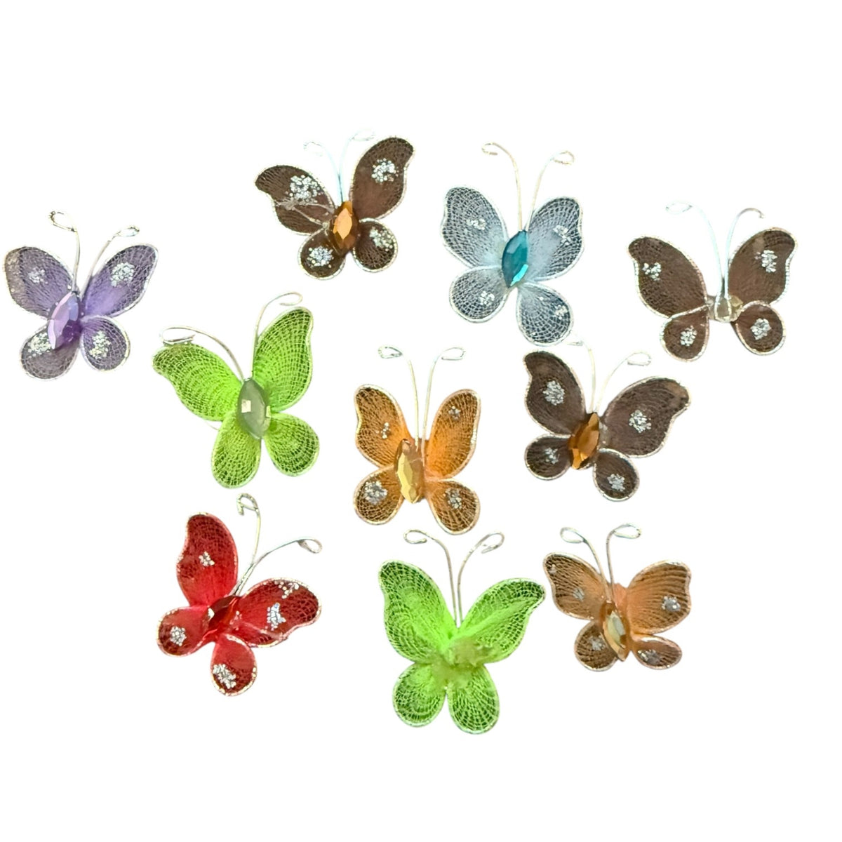 A set of nine decorative butterfly ornaments in various colors including purple, green, orange, brown, and red, arranged on a plain white background.