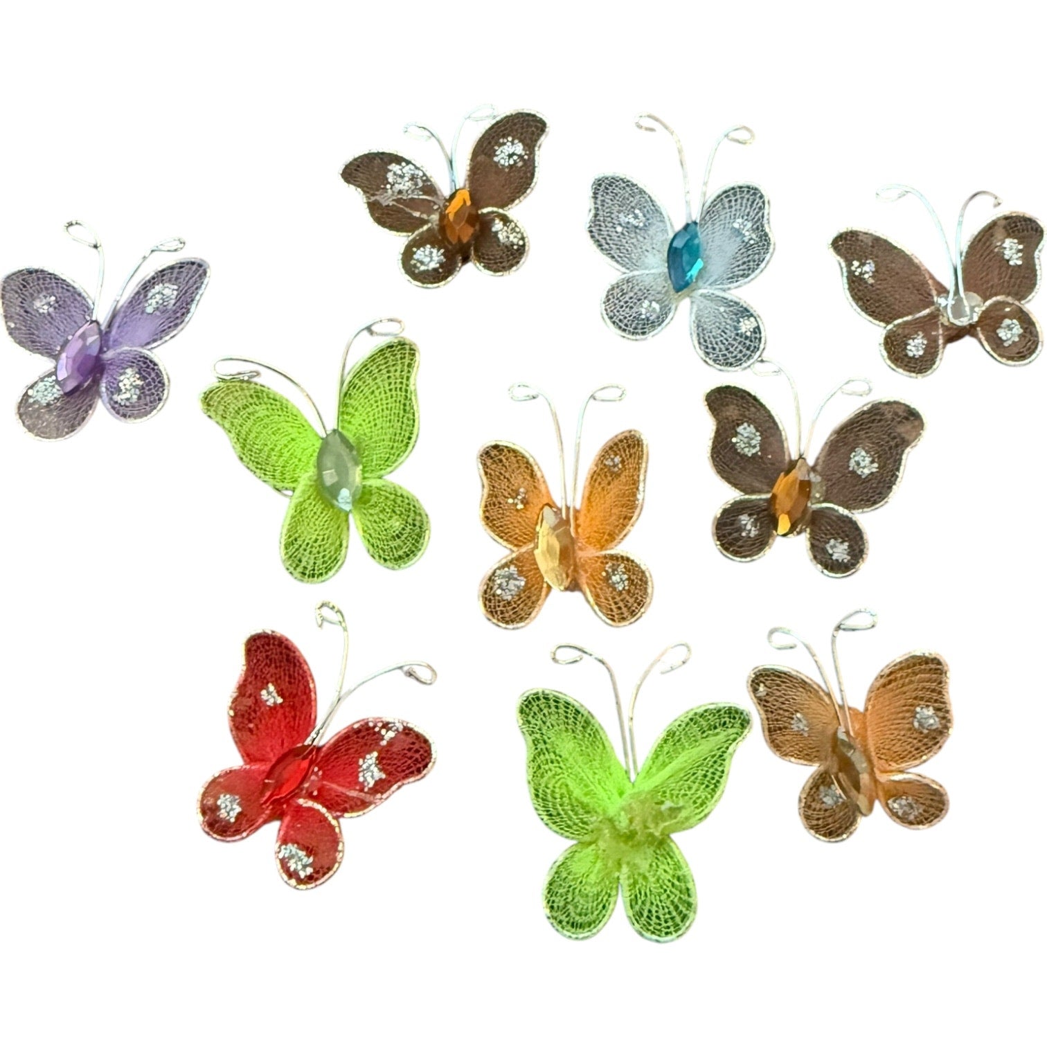 Colorful butterfly decorations on a white background