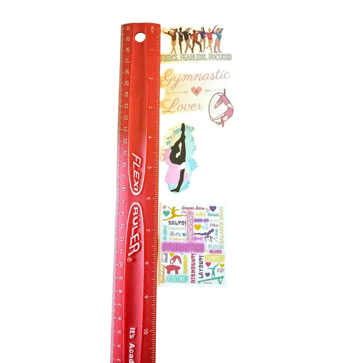 Red ruler with gymnastics-themed stickers on a white background