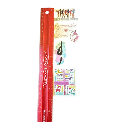 Red ruler with gymnastics-themed stickers on a white background
