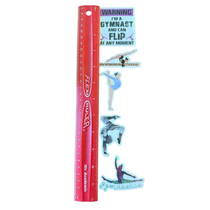 Ruler with gymnastics-themed stickers on a white background