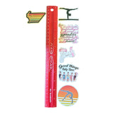 Ruler with various stickers on a white background
