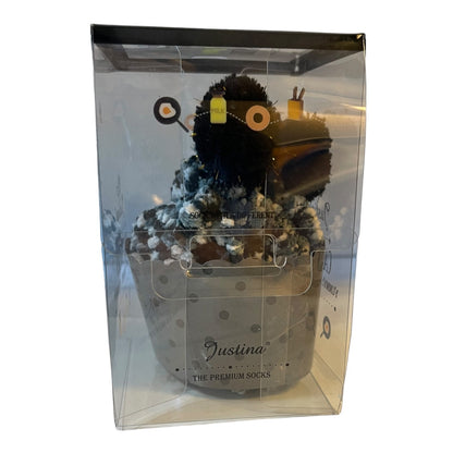 1 pair of cupcake socks in a clear packaging box with 'Justina' branding.