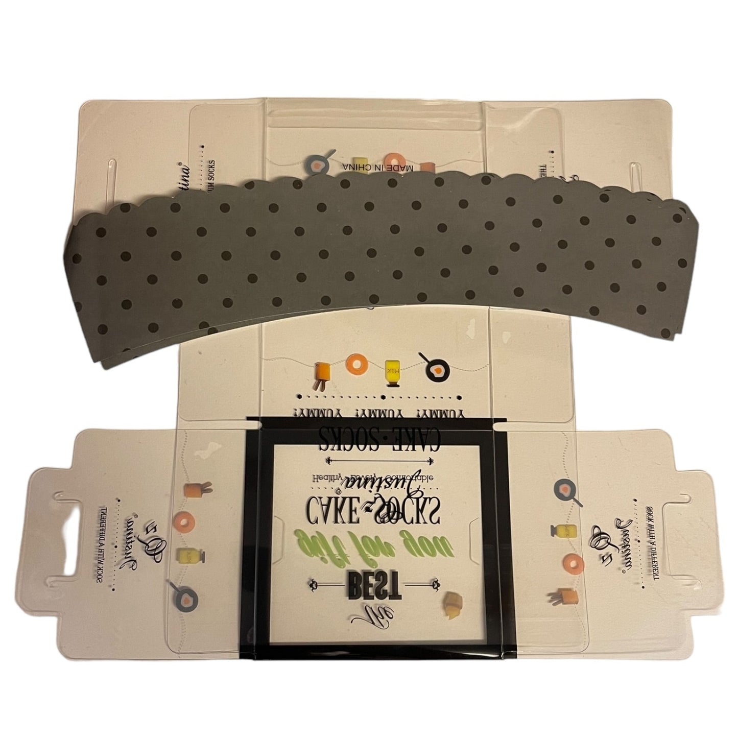 Plastic product packaging with a decorative flap and printed design on a white background