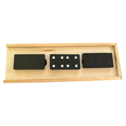 Set of dominoes with a wooden tray on a white background