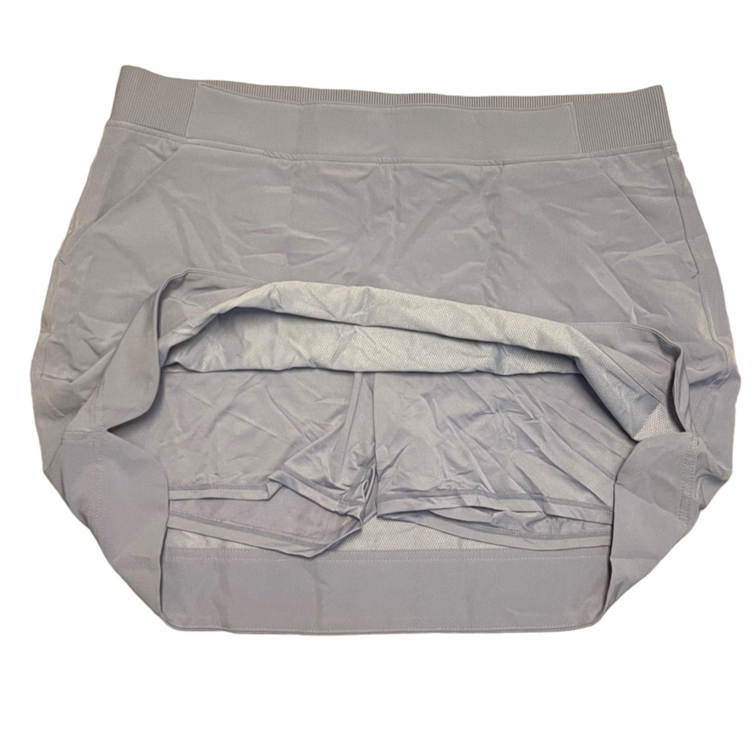 Purple skort showing shorts on a white background