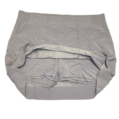 Purple skort showing shorts on a white background