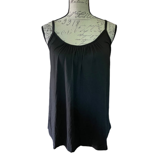 Black sleeveless top on a mannequin against a white background