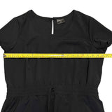 Pit to pit of black dress