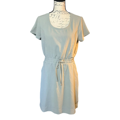 Gray dress on a mannequin against a white background