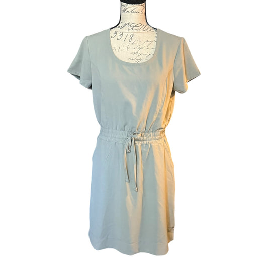 Gray dress on a mannequin against a white background