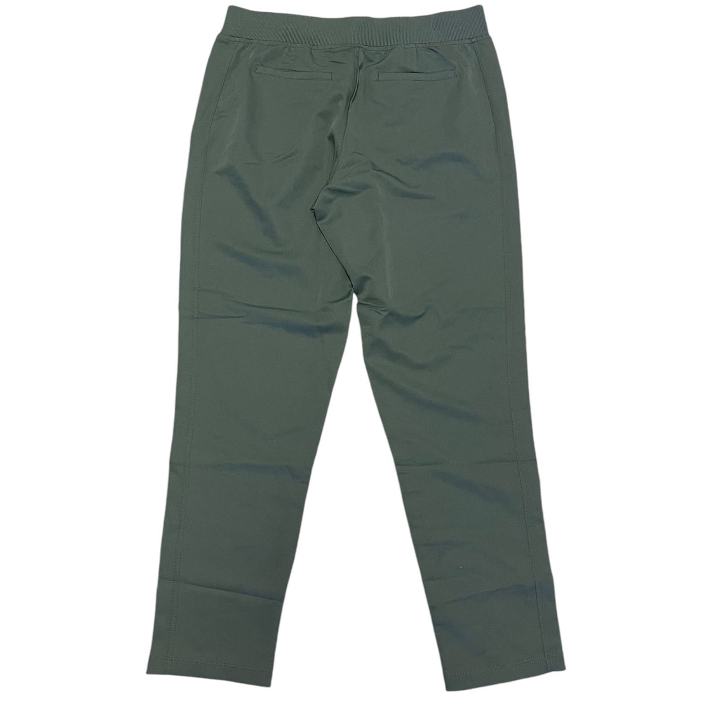 Back of green pants on a white background