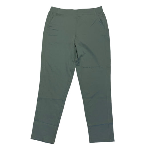 Front of green pants on a white background