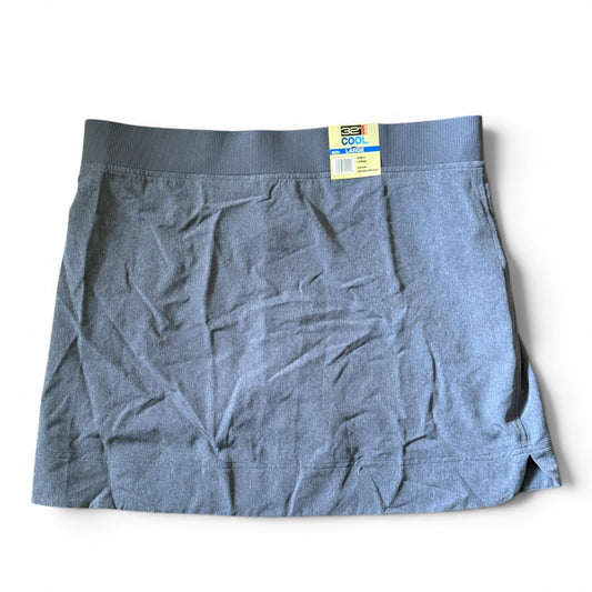 Blue skort with a tag on a white background