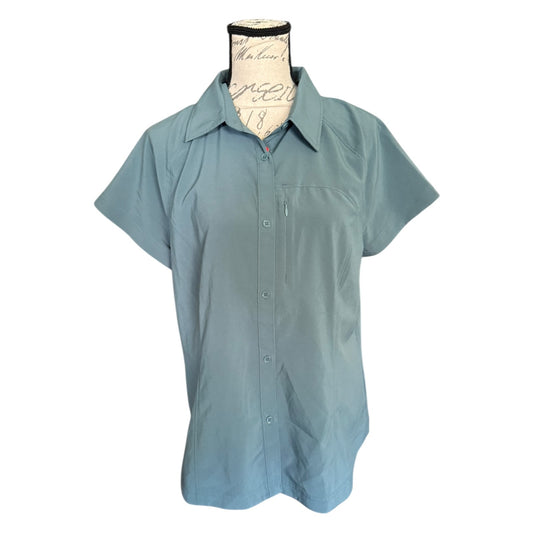 Front of green button front shirt on a white back ground